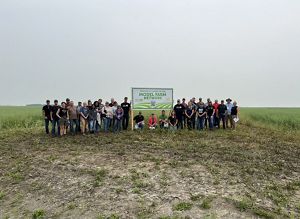 Group of farmers posing for a photo. 