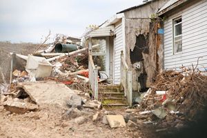 Home surrounded by debris after Superstorm Sandy.