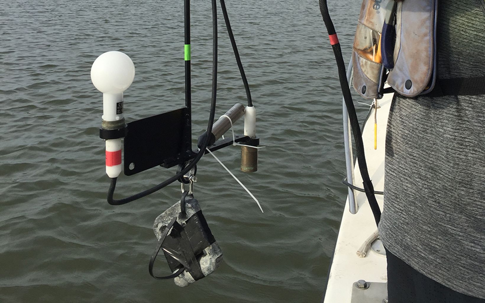 Scientists lower this sensor over the side of the boat to determine both how much light is being absorbed and how much is being scattered by particles in the water.