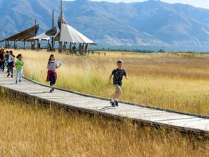 Children running on boardwalk of the Great Salt Lake.