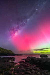 Pink, purple and green Aurora Australis.