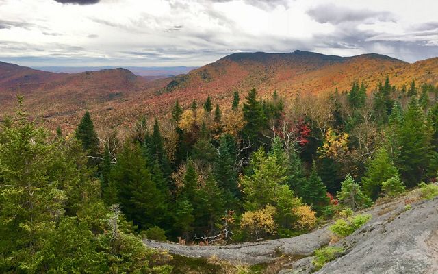 Photo of colorful fall foliage on Burnt Mountain in Vermont. 