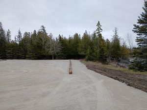 A newly-resurfaced gravel turnout lot at the Bush Bay Trailhead. 