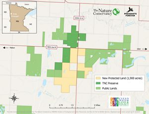 Map of the new acquisition with surrounding protected lands outlined.