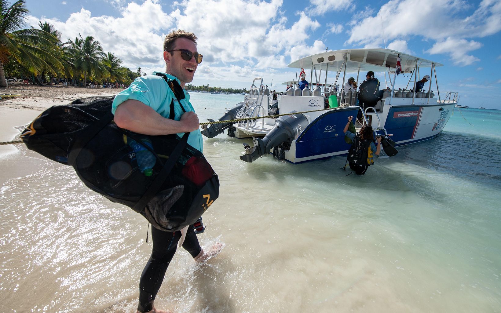 Joe Pollock, Coral Strategy Director, heads to the boat for a dive off the coast of the Dominican Republic.