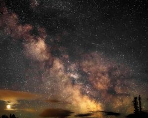 night sky with clouds and stars