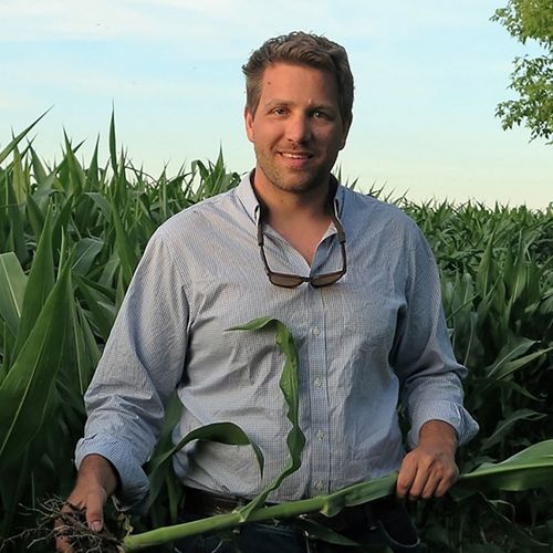 Headshot of Leif Fixen in a field.