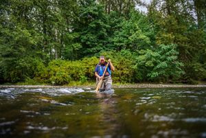 Person working in a river. 