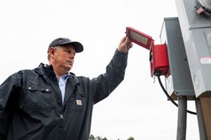 Growers like rice farmer Kotton Guest have found that using new irrigation timers (pictured) save them time in the fields, money--and precious water resources.
