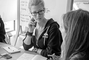 Erin Rothman sits and listens to another Techstars participant