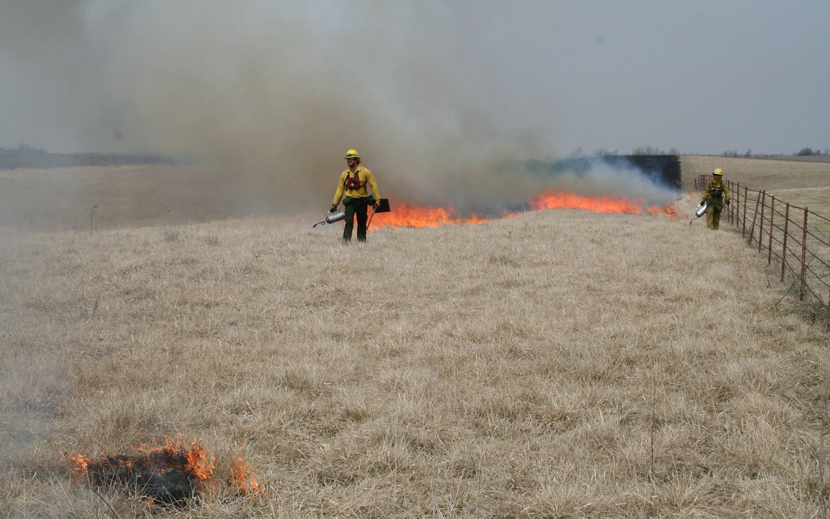 
                
                  Controlled burn TNC staff conduct a controlled burn in the Grand River Grasslands.
                  © J. Wildman
                
              