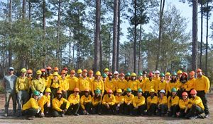 All 44 trained GulfCorps members pose after completing Firefighter Type II training at Camp Tiak in Wiggins, MS, in December 2018.