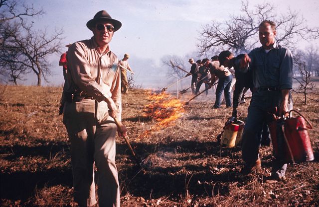 In this 1962 photo, Nature Conservancy workers start the organization's first controlled burn on a preserve in Minnesota.