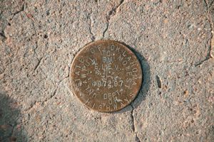 Marker noting the highest point in Oklahoma at 4,973 feet above sea level.