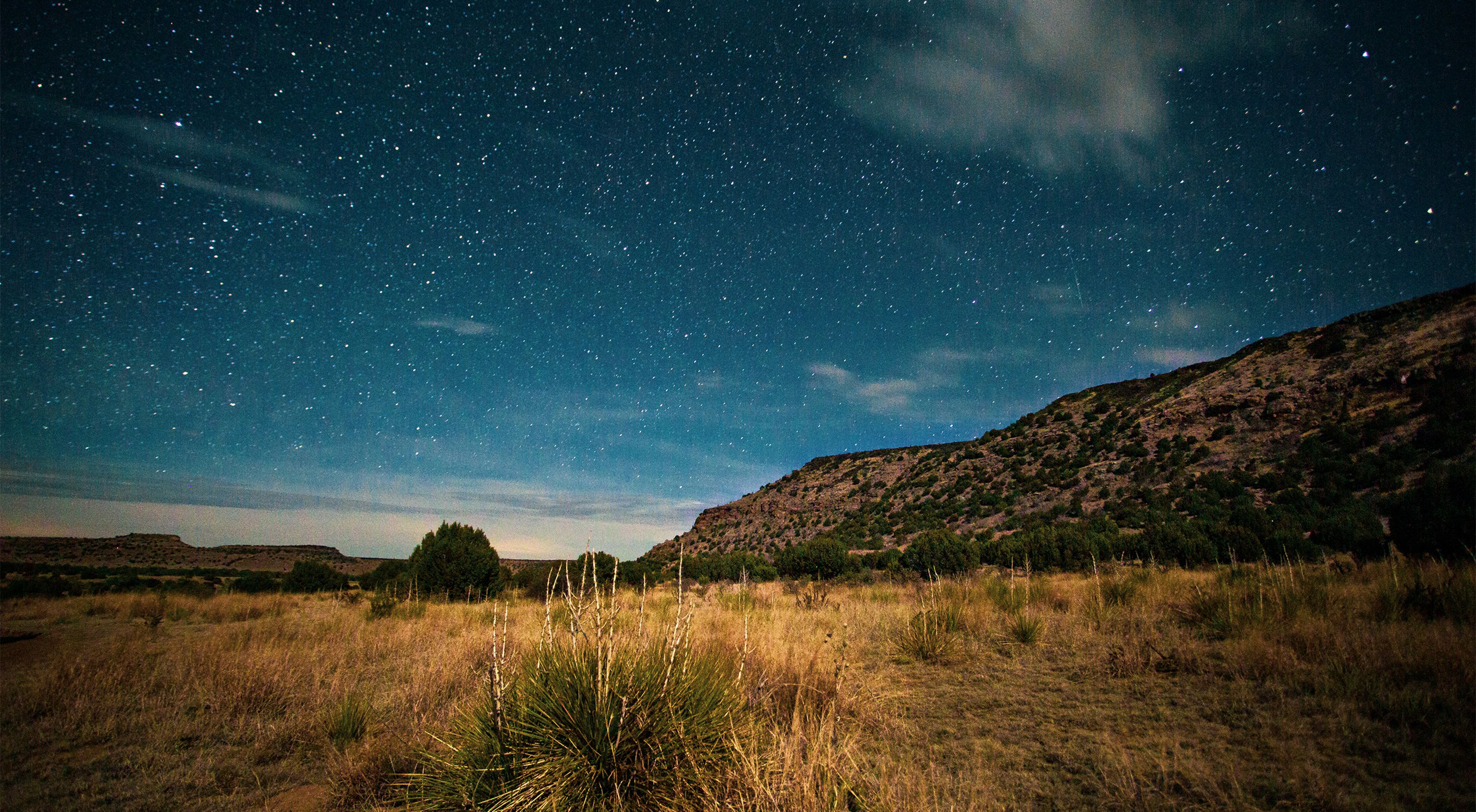 Under the emerging stars as the sunsets at Black Mesa State Park and Nature Preserve.