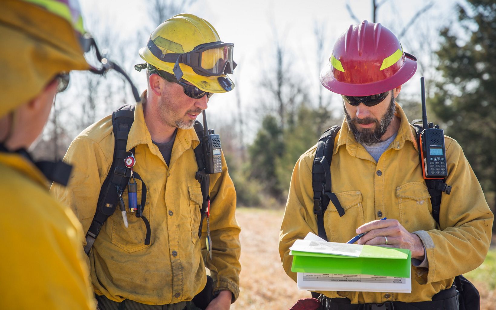 Kentucky Fire Management  Burn boss and TNC fire manager and land protection director, Chris Minor, briefs Josh Lillpop of the Office of Kentucky Nature Preserves before a prescribed fire.  © Mike Wilkinson