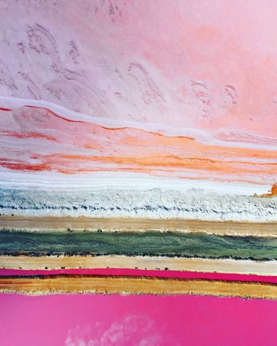 Drone photo showing the pink hues of a pink lake called Hutt Lagoon, Western Australia.