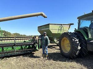 Farmer Roger Smith takes a break from harvesting soybeans.