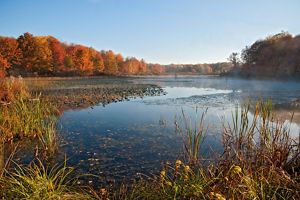 Snow Lake surrounded by autumn-colored trees.