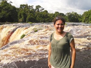 Marie-Claire Paiz standing in front of a rushing river