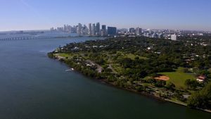 Aerial view of Brittany Bay Park in Miami Beach, which sits along the shoreline with high-rise buildings behind it.