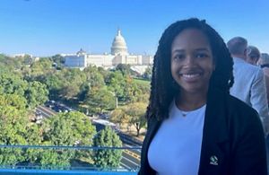 A photo of Michelle in front of the US Capital building.