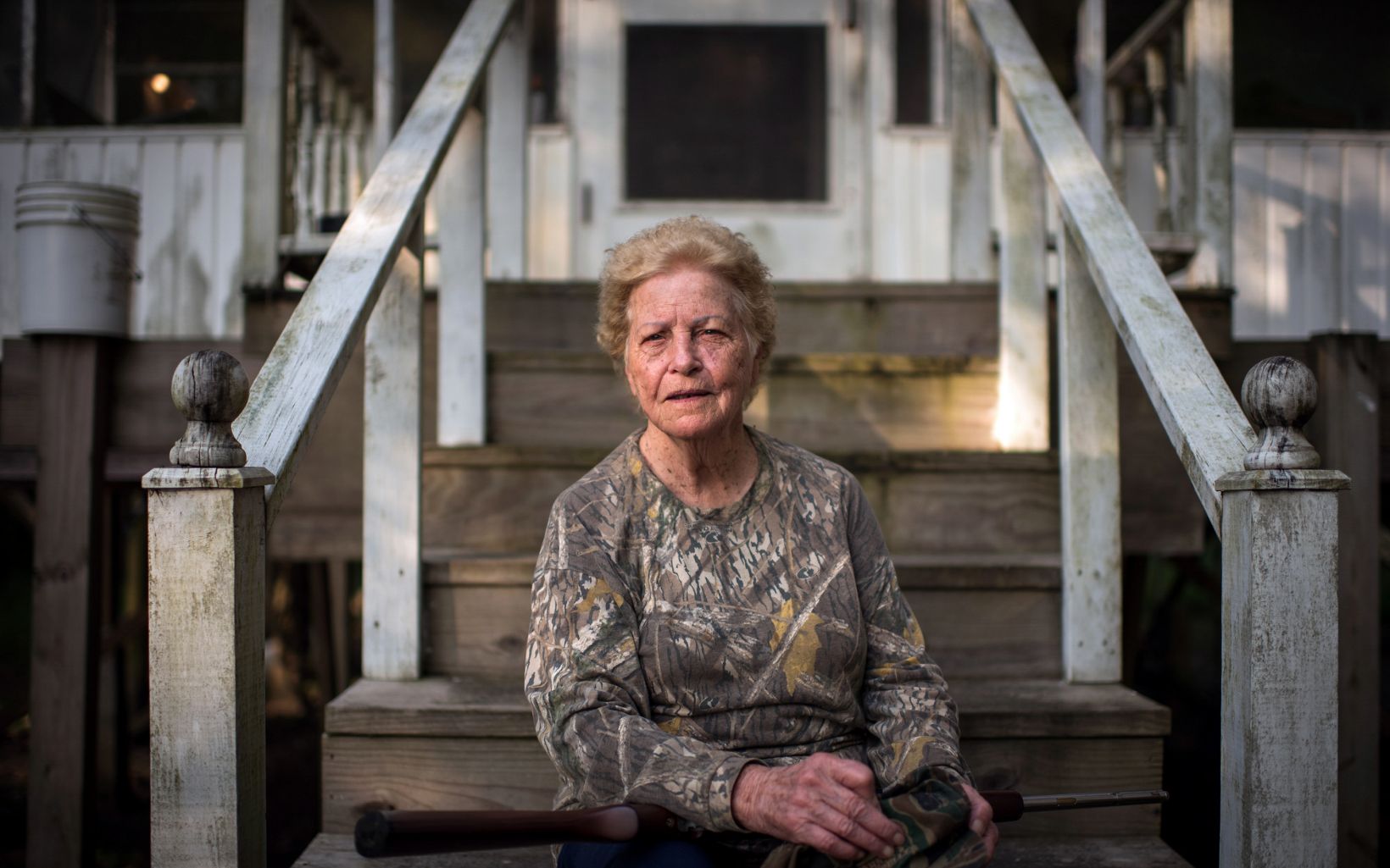 
                
                  Miss Annie Squirrel hunter Annie Mendoza, 85, poses for a portrait outside her hunting cabin in Bayou Sorrel. Hunting and fishing are sources of recreation and sustenance for locals.
                  © Rory Doyle
                
              