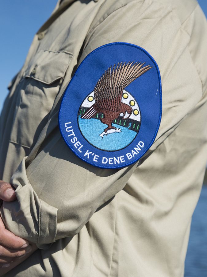 A close up of a ranger's arm with an eagle patch
