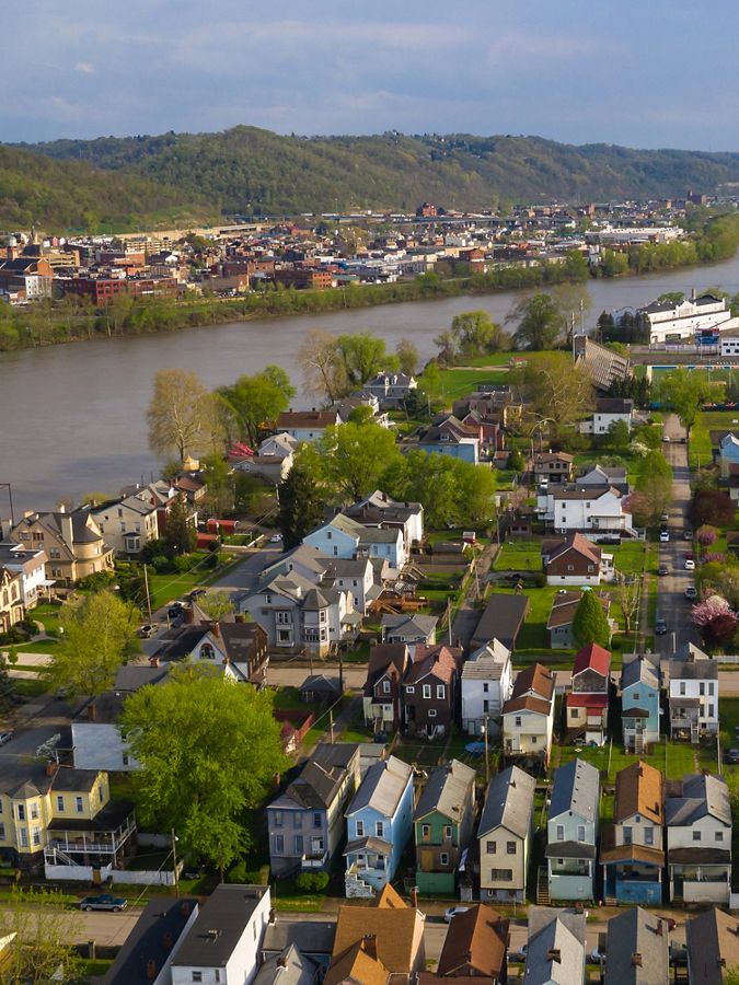 aerial view of west virginia town along a river