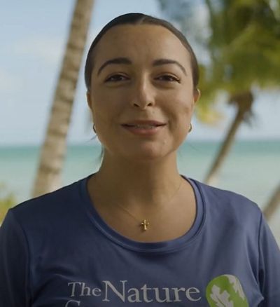 a white woman smiling in a headshot