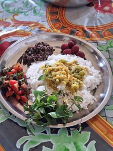 A meal consisting of rice and fresh berries.