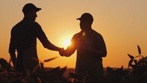 Two men shaking hands.