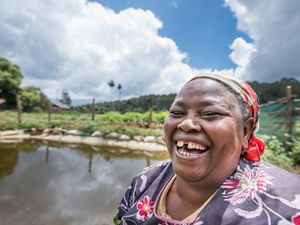 Elena Kinyua, an innovative farmer in the foothills of Mt. Kenya, receives support from the Upper Tana-Nairobi Water Fund. 