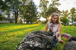 Farmer Ann Brandt with her turkeys.