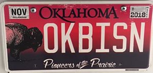Custom license plate that reads "OKBISON"