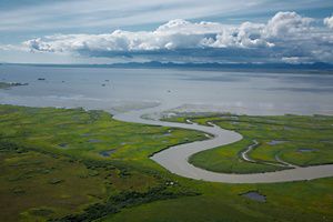 Aerial view of the Alaskan landscape of Bristol Bay and mountains.