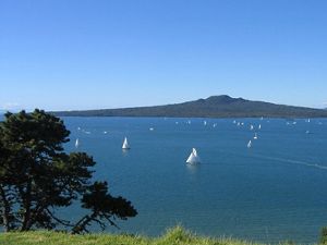 Expansive view of blue water and sailboats