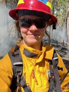 Grace Parker wearing Personal Protection Equipment.