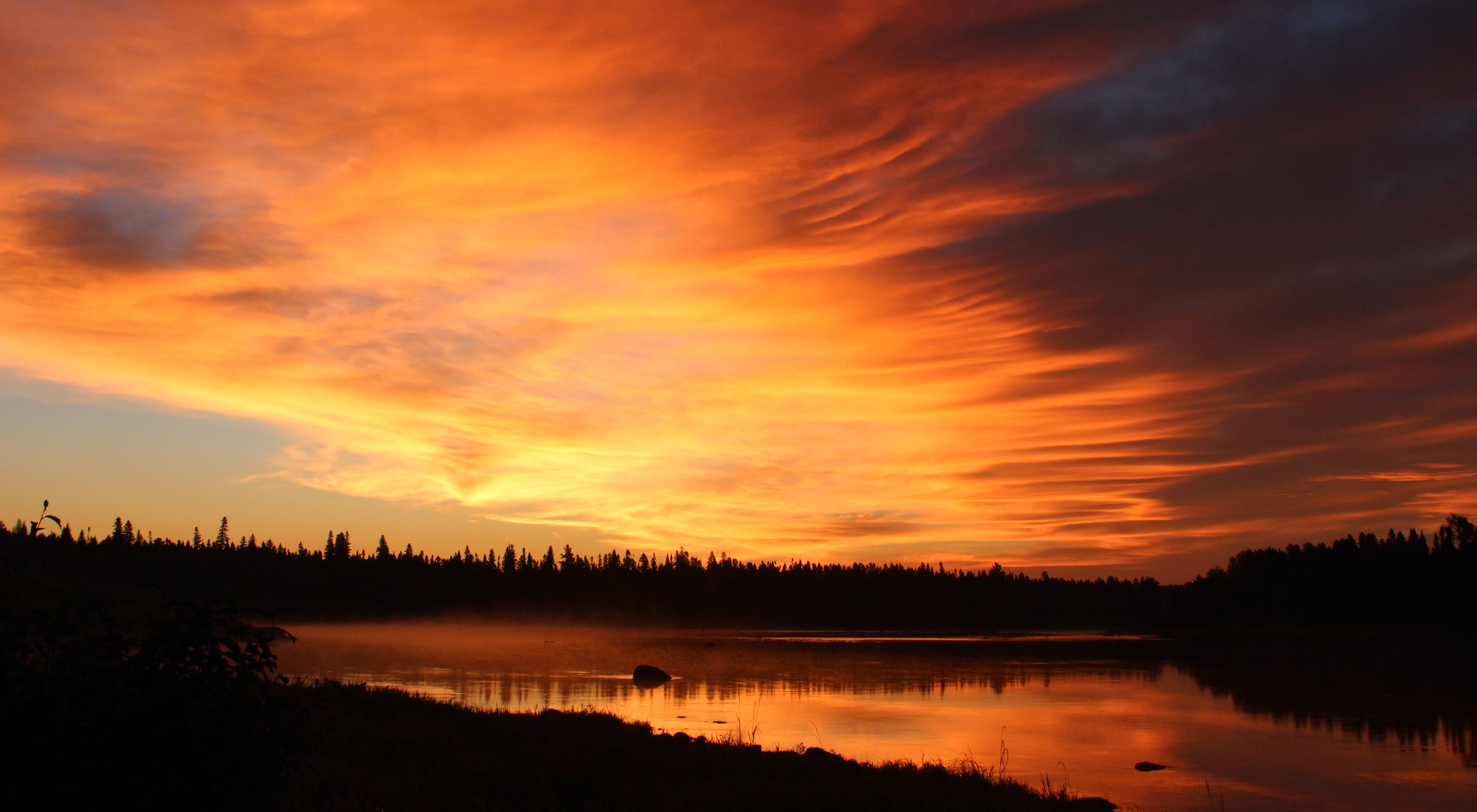 A brilliant orange sunrise over the St. John River.