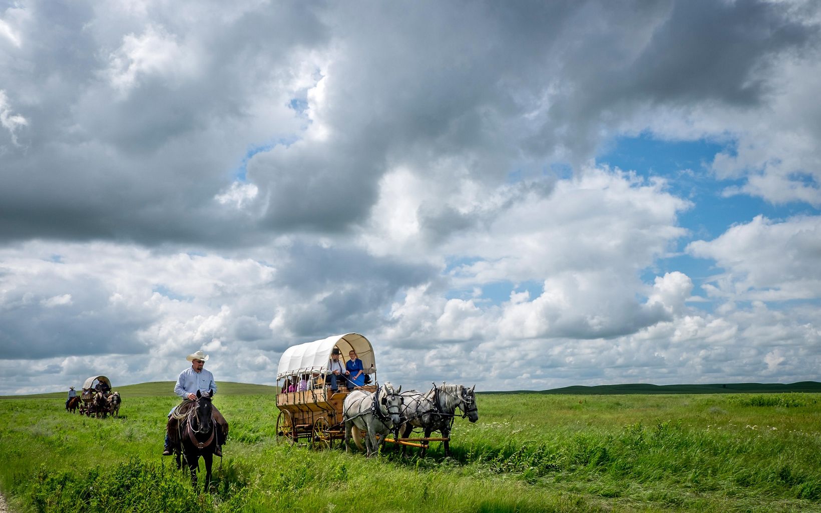 Symphony in the Flint Hills Guests make a day of visiting the prairie. It starts with a wagon ride or hike from the parking lot, followed by art exhibits, music, natural-history talks, and hiking. © Tom Parker