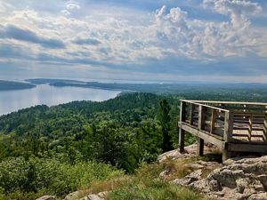 Overlook with sweeping view of forest and the shore of Lake Superior.