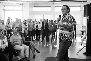 A man speaks to a room full of Techstars participants
