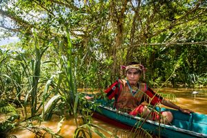 A local resident canoes through East Kalimantan, Indonesia.