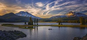 A lake surrounded by mountains.