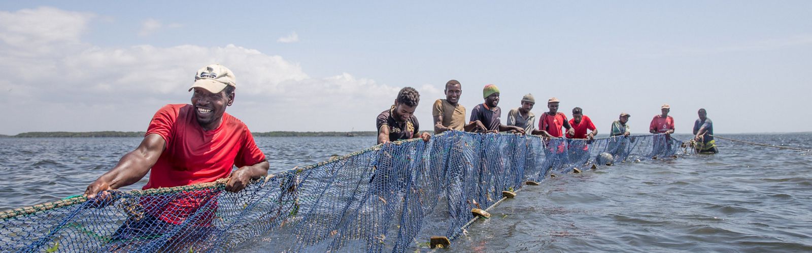 Fishermen from Pate Island in Lamu County pull a beach seine net in the Indian Ocean waters.