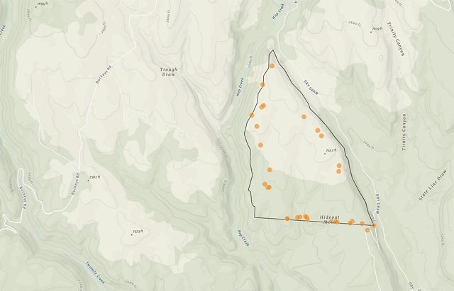 Topographic map showing a triangular section with orange dots highlighting specific points of interest.