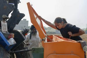 Amandeep Kaur and her father check their Super Seeder.