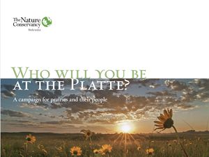 Cover of the campaign brochure showing the sun setting over a wide prairie.