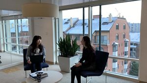 Two people site facing each other in an office at TNC headquarters.