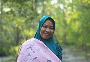 One of the Semanting Bay Village female group members was holding their batik creation.